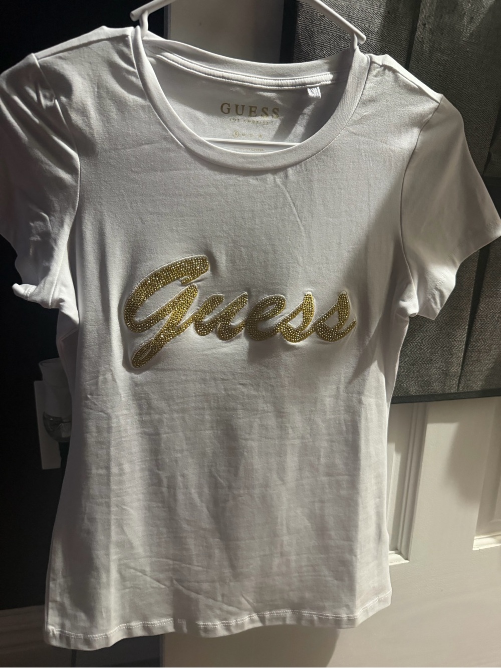 Guess White Tee with Gold Script Logo